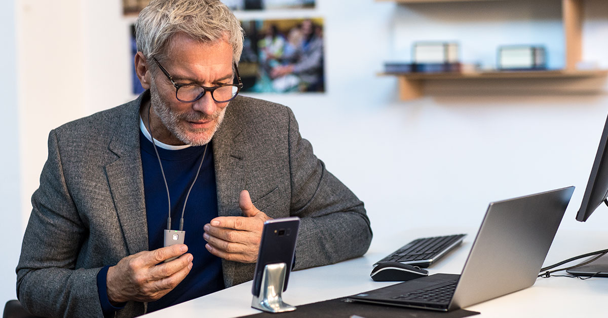 Man using video call at a desk