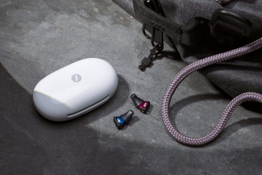 White hearing aid case with two devices